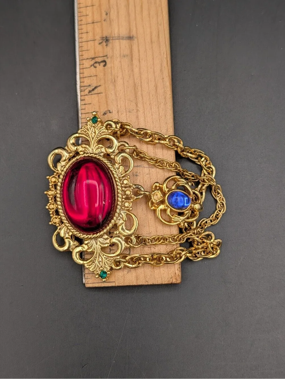Vintage 1980s Regal Brooch Ruby Red Blue Glass Cabochon Draped Chain Pin